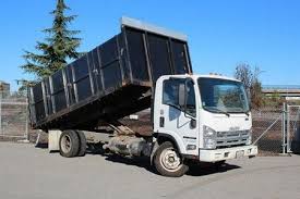 Best Construction Debris Removal  in Clinton, IA